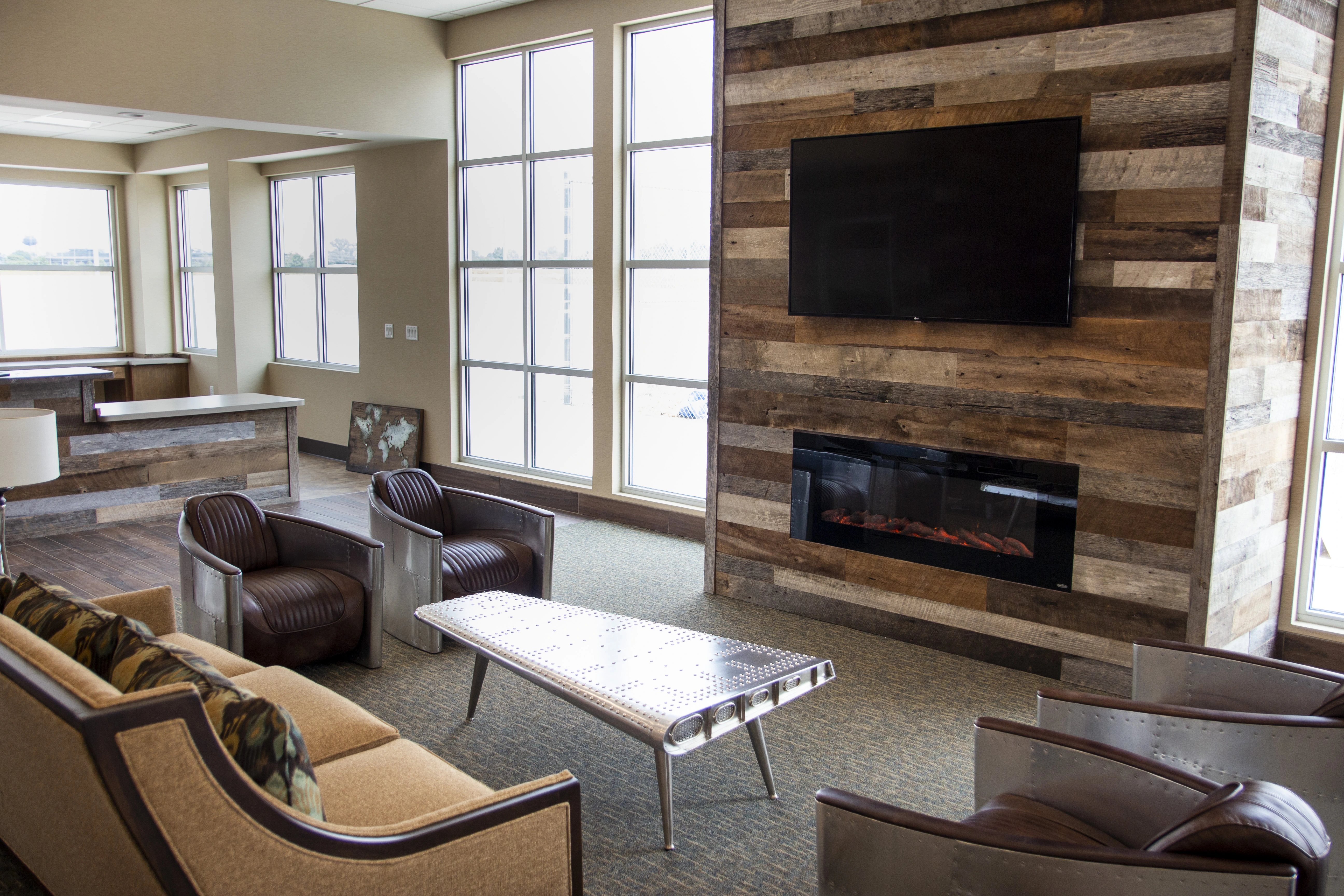A living room with a mixed wallboard