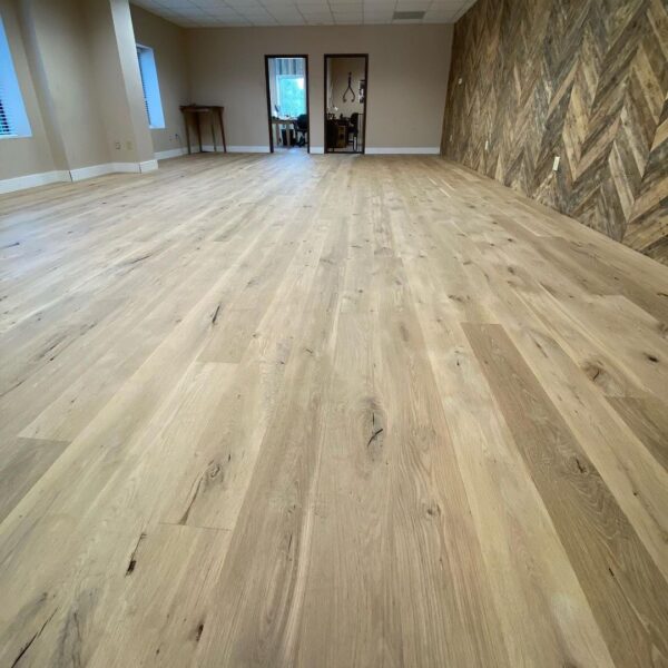 A room with rustic white oak flooring