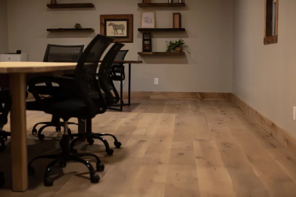 A room with a table and chairs on an engineered Euro oak floor